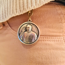 Load image into Gallery viewer, Pope Francis Keychain - Silver keychain with a circular pendant featuring an engraved portrait of Pope Fracis and the Apparitions of Fatima
